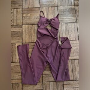 ALO onesie, Burgundy truffle size S, never worn!!! Completely Sold out piece.